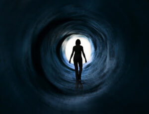 Photo of a women alone in a tunnel